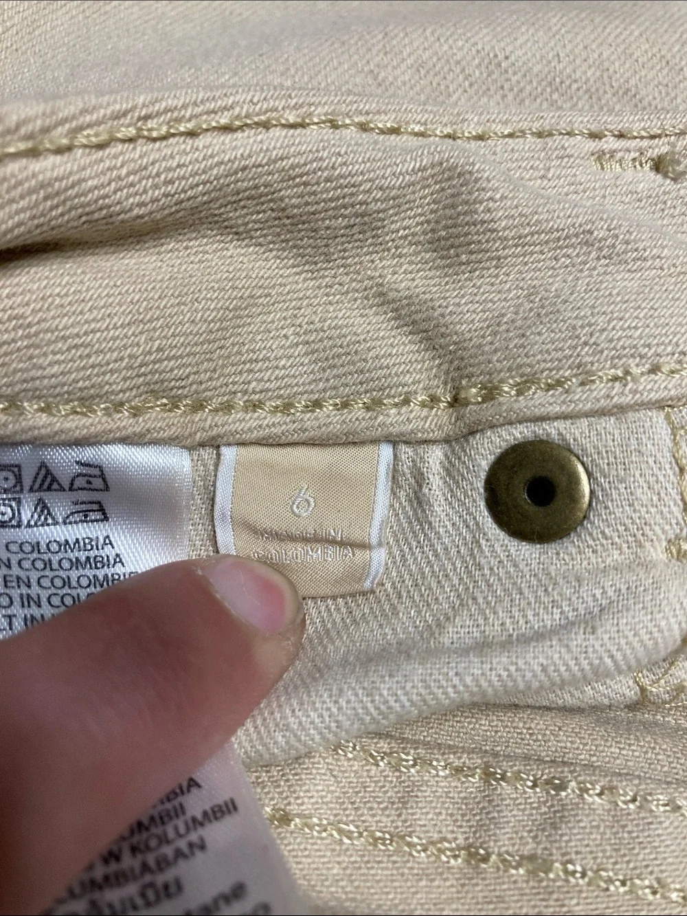 Michael Kors tan Bermuda shorts.